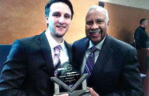 Matt Cotiguala of St. Ambrose University receives the 2015 Fred Mitchell Award during the annual National Football Foundation ceremony at Halas Hall in Lake Forest, Illinois.